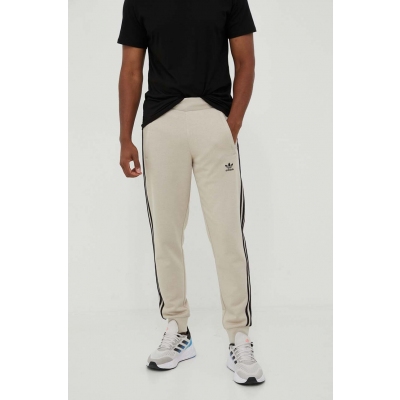 adidas Originals pantaloni de trening culoarea bej, cu imprimeu
