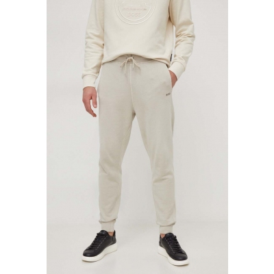 BOSS pantaloni de trening din bumbac BOSS CASUAL culoarea bej, neted