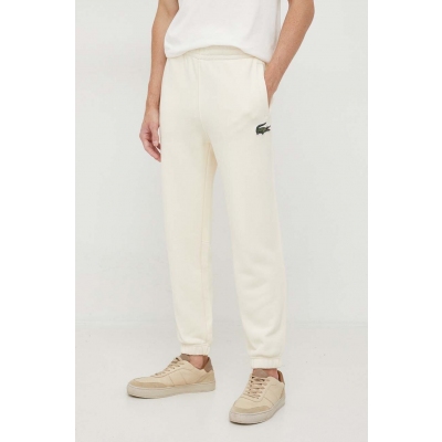 Lacoste pantaloni de trening din bumbac culoarea bej, neted