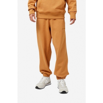 New Balance pantaloni de trening din bumbac culoarea portocaliu, neted