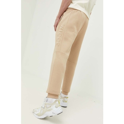 Nicce pantaloni de trening culoarea bej, cu imprimeu